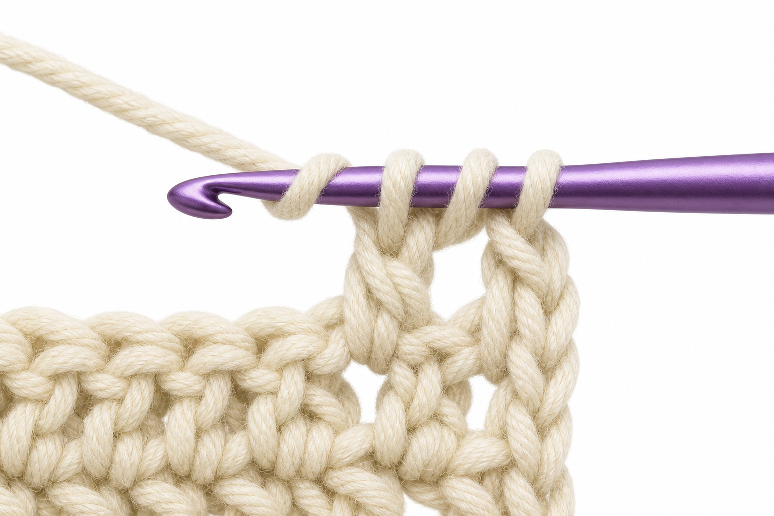 Close-up instructional illustration: double crochet mid-stitch with three loops on the hook