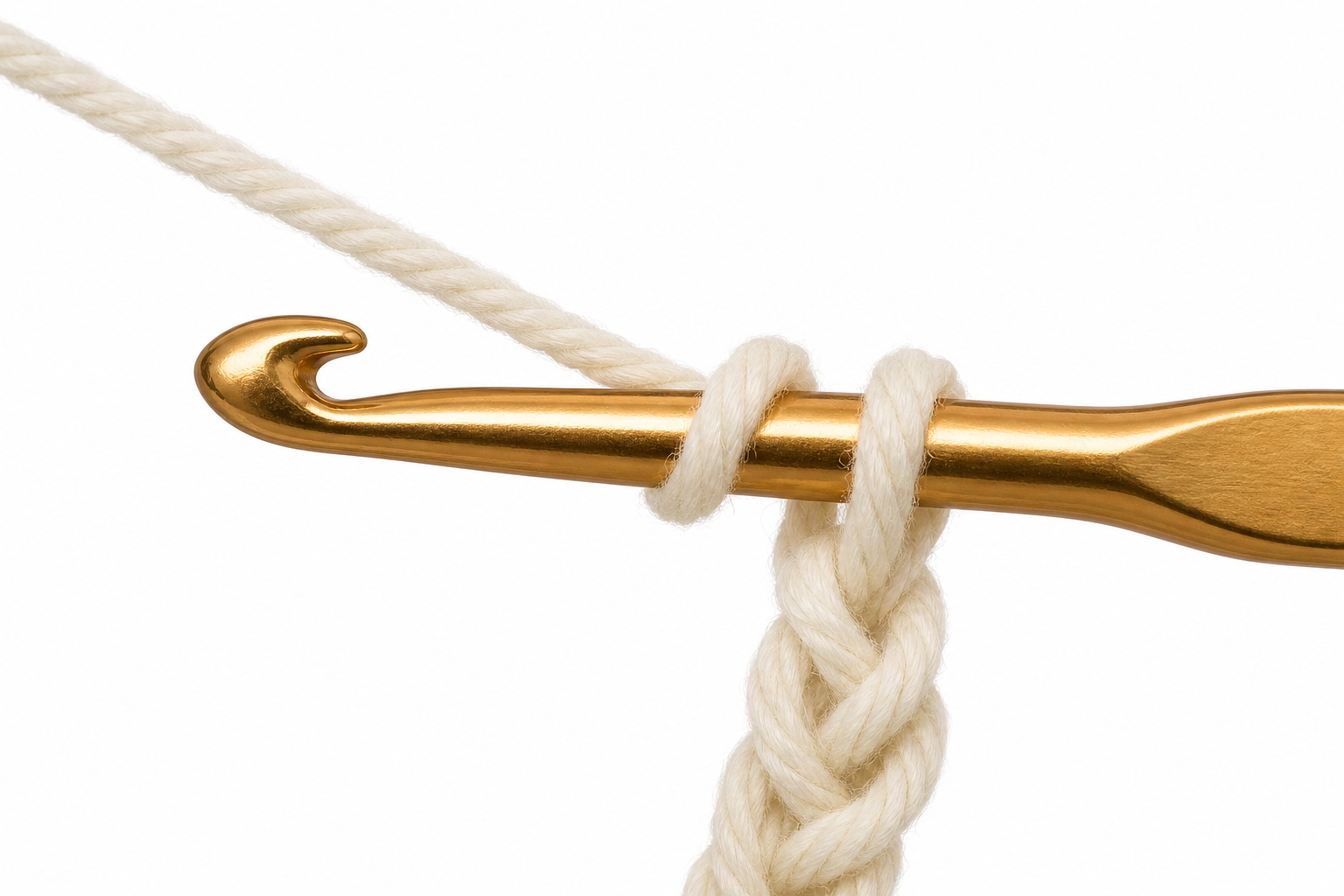 Close-up instructional illustration: yarn wrapped once on the crochet hook